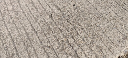 concrete road surface with white stripe  