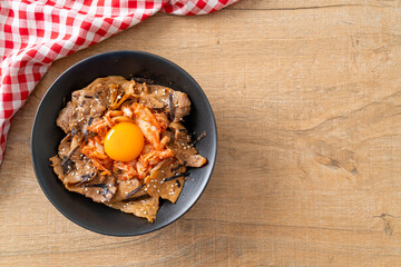 pork bulgogi rice bowl with kimchi and Korean pickled egg