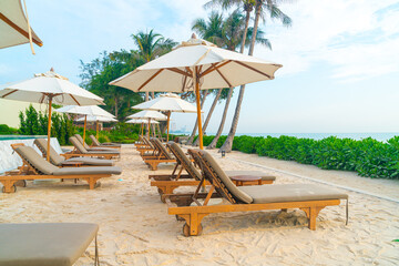 umbrella with beach chair and ocean sea background