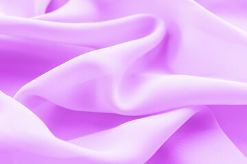 folds of purple silk fabric texture background