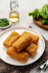 Risol Mayo, Risoles mayo with mozzarella filling, a small patty enclosed in pastry or rolled in bread crumbs. it is filled with smoked beef, mayonnaise, boiled egg and mozzarella cheese. 