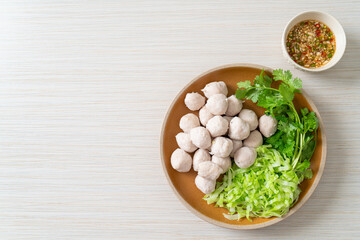 pork meatball with vegetable and spicy sauce