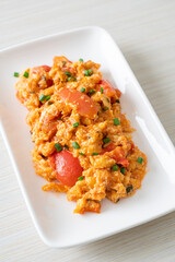 Stir-fried tomatoes with egg or Scrambled eggs with tomatoes