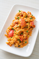 Stir-fried tomatoes with egg or Scrambled eggs with tomatoes