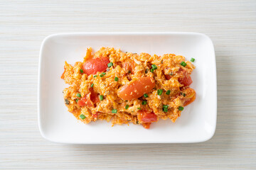 Stir-fried tomatoes with egg or Scrambled eggs with tomatoes