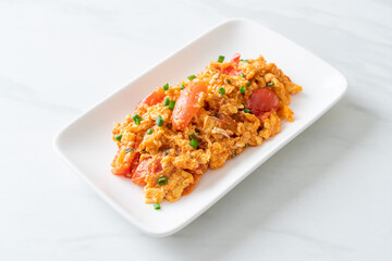 Stir-fried tomatoes with egg or Scrambled eggs with tomatoes