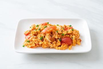 Stir-fried tomatoes with egg or Scrambled eggs with tomatoes