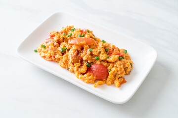 Stir-fried tomatoes with egg or Scrambled eggs with tomatoes