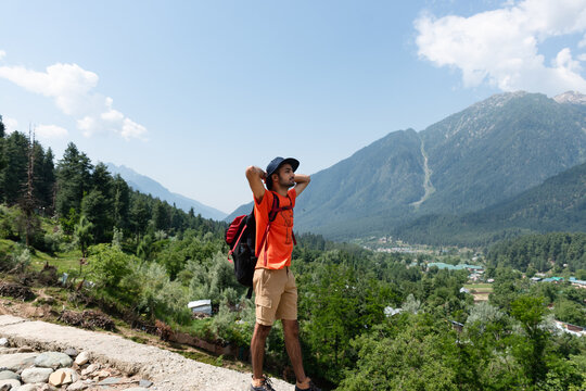 Hiker in the mountains, Betaab Valley, Pahalgam, Jammu and Kashmir, India.