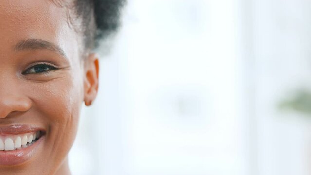 A great skincare routine and dental hygiene resulting in healthy teeth and glowing skin. Closeup of an attractive woman in a good mood. Smiling, happy young female face feeling beautiful in her skin
