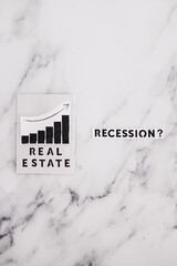 recession text with question mark next to real estate stats going up, post pandemic economy