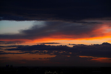 Orange sky at sunset after rain in Kazakhstan. High quality photo