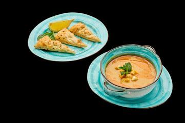 Classic lentil puree soup, Magic chorba on a black isolated background