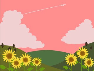 夏の夕暮れの山景色とヒマワリ