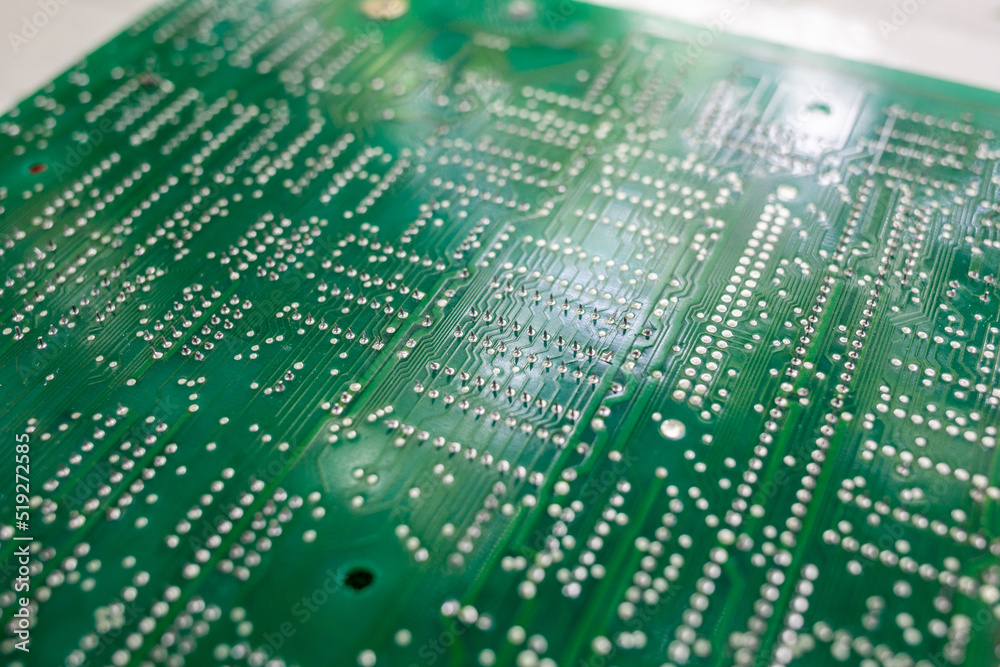 Leinwandbilder Old computer chips that are out of order. Not working microshops with transistors, chips and conductors. Blue system board with microchips and transistors