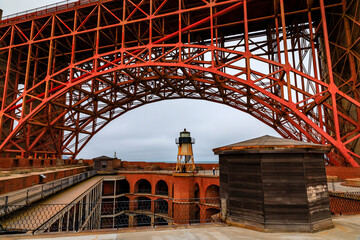 Fort Point courtyard and lighthouse under the Golden Gate in San Francisco, CA