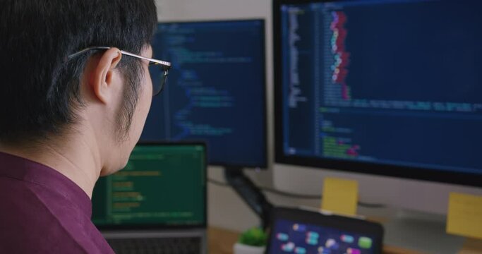 Digital transformation future workforce web DEV career development. Asia people young talent man busy work at home office reskill upskill martech job remote test on AI cloud computing cyber security.