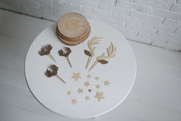 The elements for decorating a Christmas cake are on a white table