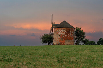 Old, historic windmill in Kunkovice in Moravia at sunrise in summer © Elżbieta Kaps