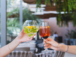 a couple drinking cocktails at a celebration
