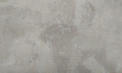 Wall fragment with scratches and cracks.vintage dirty exfoliating plaster Textured background peeling of colour wallpaper cement.The​ pattern​ of​ surface​ wall​ concrete​ for​ background.