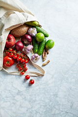 Healthy vegan food ingredients in cotton eco bag