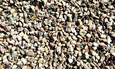 Abstract background with lot of various shape peeble stones. 