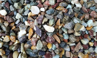 Abstract background with lot of various shape peeble stones. 