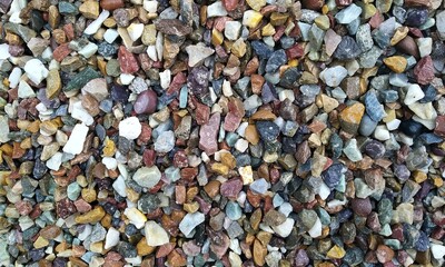 Abstract background with lot of various shape peeble stones. 