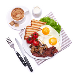 Fried eggs, bacon, tomato, toasted bread in ceramic plate and cup of coffee isolated on white background