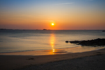 Fototapeta na wymiar Saint-Malo beach and seascape at sunset, Brittany, France
