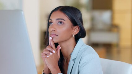 Thinking marketing agent typing on a computer, brainstorming global business branding ideas and planning creative solutions. Serious, confident and ambitious marketer working on company social media
