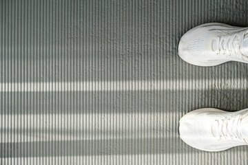 Fitness, roll on the fitness mat for myofascial release. Fascia massage, wellness, health, sports,