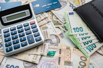 euro and hryvnia banknotes with credit card purse, financial conept, exchange. Eur  vs UAH