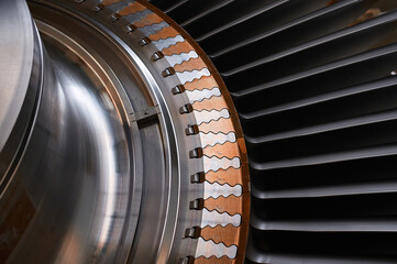 The rotor blades of a modern turbine, a close-up shot of the roots of long blades © nordroden