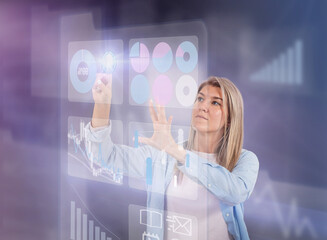 Girl works with tables on a hologram in virtual reality