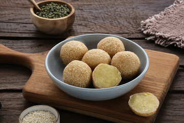 Onde-Onde is traditional food from Indonesia made from glutinous rice flour with beans pasta, wrapped in sesame seeds. Popular Indonesian snack with Chinese influence. 