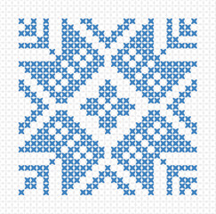 Scandinavian ornament, blue floral snowflake, cross stitch needlework on white background