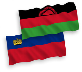 Obraz premium National vector fabric wave flags of Liechtenstein and Malawi isolated on white background. 1 to 2 proportion.
