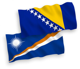 National vector fabric wave flags of Republic of the Marshall Islands and Bosnia and Herzegovina isolated on white background. 1 to 2 proportion.