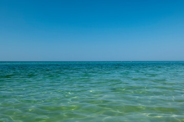 View of the clear sea and blue skies. Beautiful seascape. Waves of water on the sea