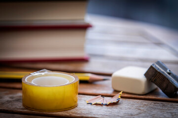 back to school concept. books, eraser, pencil, sharpener, school objects