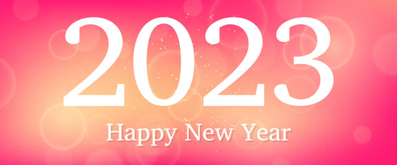 Happy new year 2023 incription on blurred background