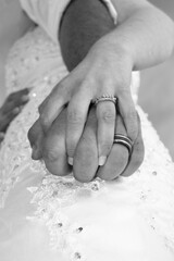 Wedding couple holding hands