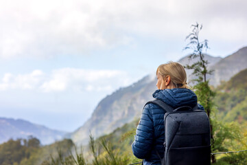 Tourist woman enjoing landscape of Madeira