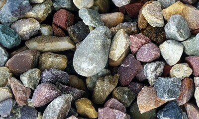Abstract background with lot of various shape peeble stones. 