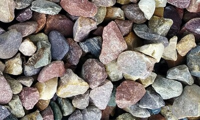 Abstract background with lot of various shape peeble stones. 