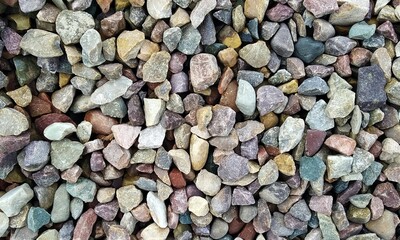 Abstract background with lot of various shape peeble stones. 