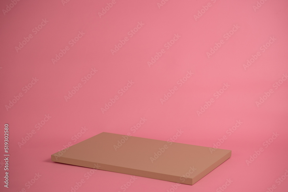 Poster empty podium for display cosmetic product. platform arrangement in pink pastel color in trendy minim
