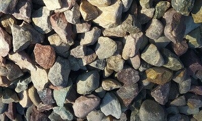 Abstract background with lot of various shape peeble stones. 